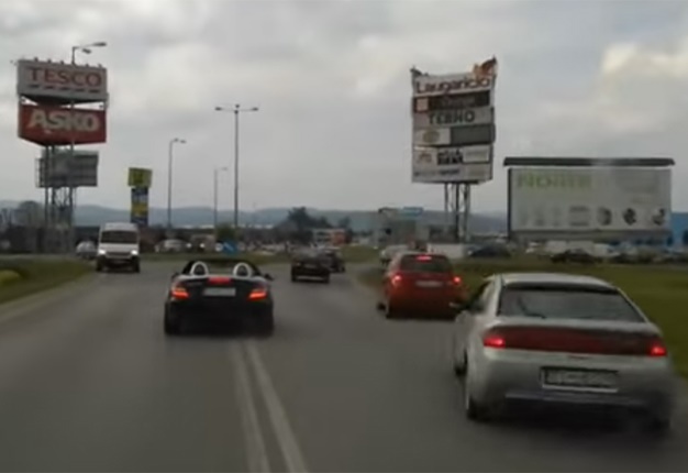 <B>INCONSIDERATE DRIVER:</B> The driver of this Mercedes-Benz SLK55 AMG receives our vote for 'Idiot of the Week' after he deliberately prevented an ambulance from passing. <I>Image: YouTube</I>