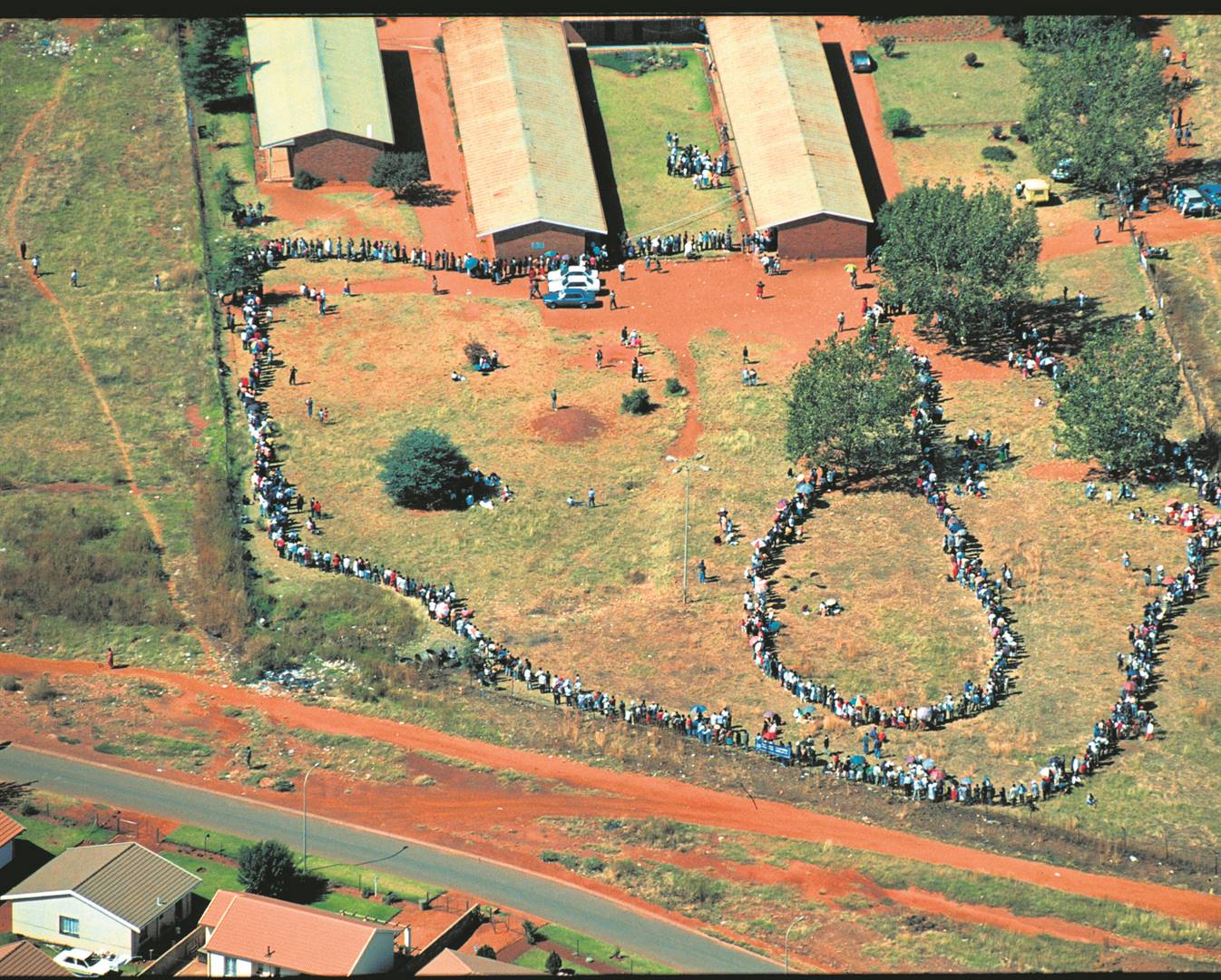 On April 27, 1994, voters waited for hours in lines stretching more than a kilometre to cast their ballot in South Africa's first democratic elections. (Archives/Media24) 