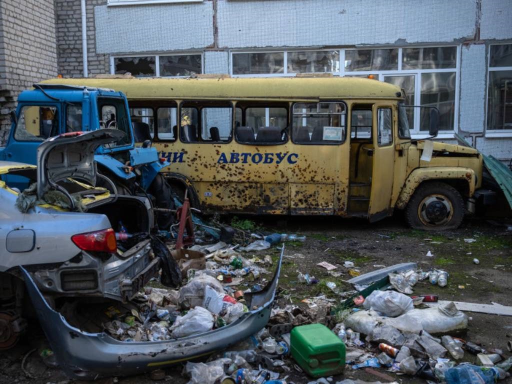 Bullet and shrapnel holes pierce the bodywork of a school bus that was destroyed during fighting between Ukrainian and Russian forces in Staryi Saltiv, Kharkiv oblast, Ukraine.