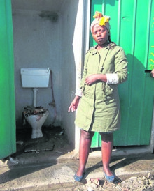 Resident Nolukholo Bonani said toilets have no locks and offer no privacy when nature calls.      Photo by Vincent Lali