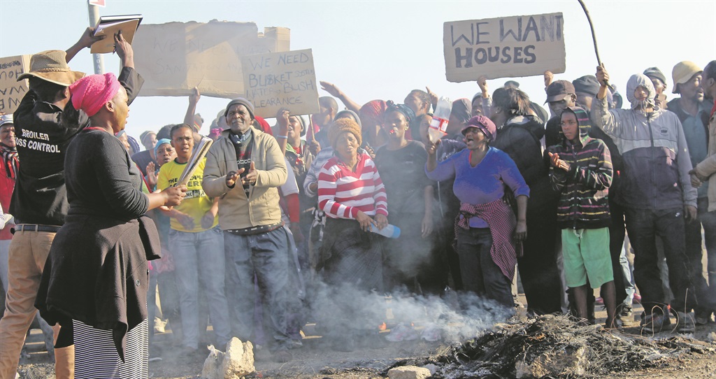 UNHAPPY Qunu informal settlement dwellers take to the streets in Chetty. Picture: Nosipiwo Manona