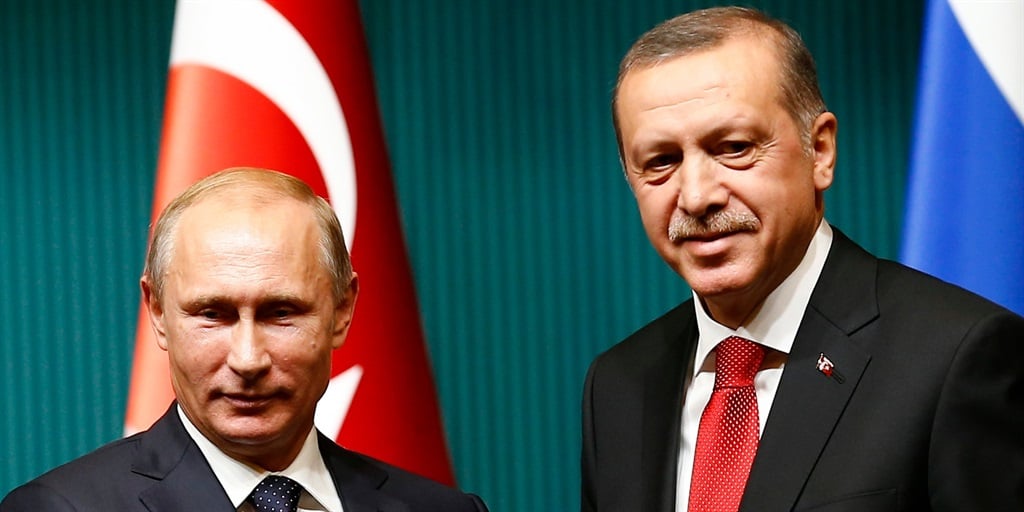 Russian President Vladimir Putin with Turkey's President Tayyip Erdogan at the Presidential Palace in Ankara, in 2014.