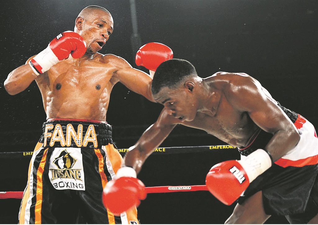INSIDE Mzonke Fana in action against Xolisani Ndongeni at Emperors Palace in June last year. Fana hopes to be a granddad and world champ at the same time.  Picture: Leon Sadiki  