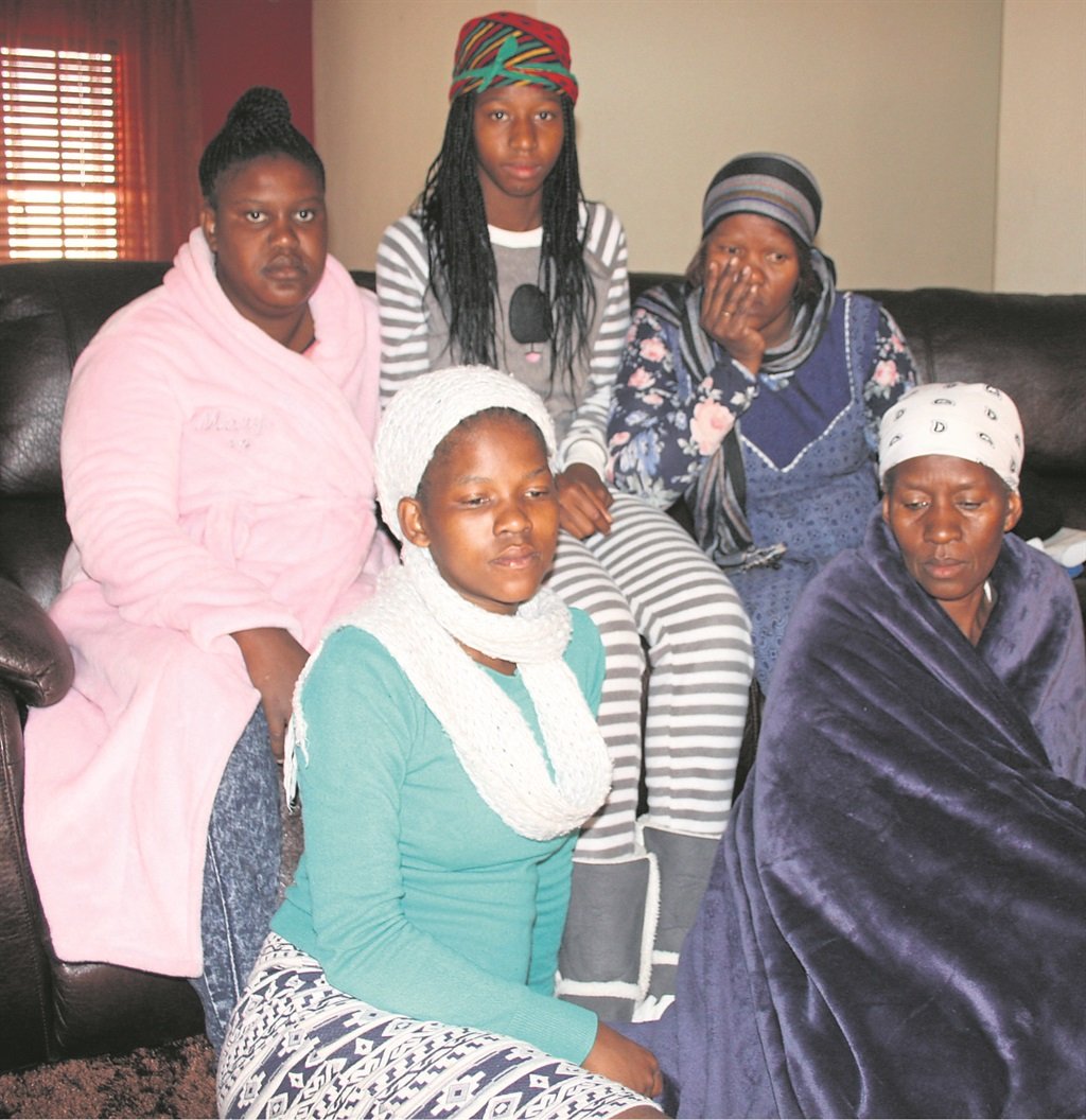 Family members mourn the death of Vusi Dlamini who was murdered on Tuesday.                          Photo by Stephens Molobi 