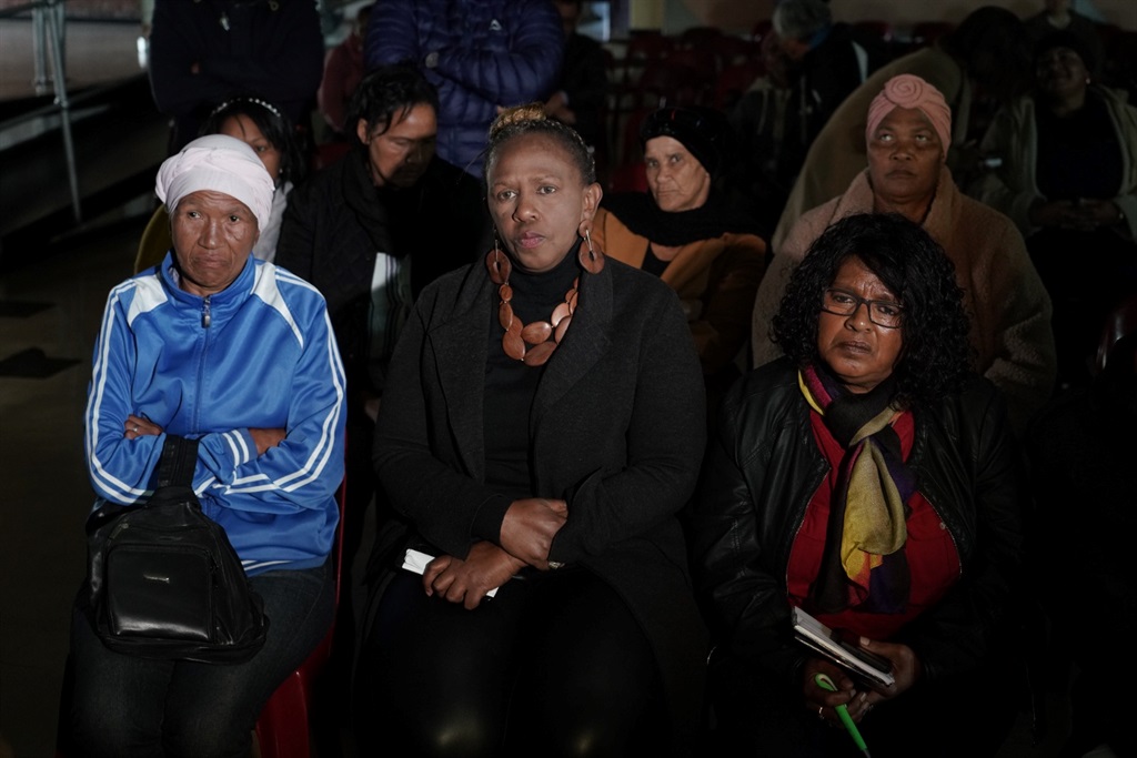 The family of Elroy Van Rooyen attends the communi