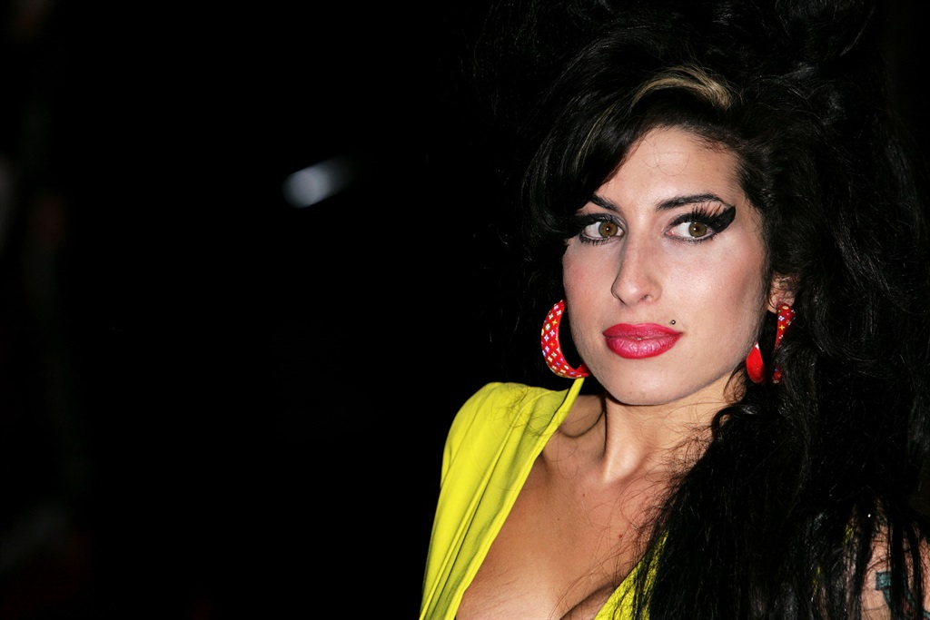 Singer Amy Winehouse arrives at the BRIT Awards 2007 in association with MasterCard at Earls Court on February 14, 2007 in London.  (Photo by Gareth Cattermole/Getty Images)