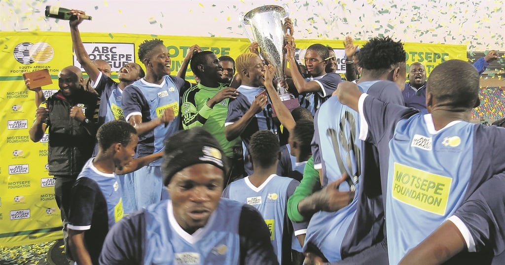 Magesi FC players and technical crew celebrate their crowning as ABC Motsepe League national champions in Bloemfontein last month.  Picture: Teboho Setena / Volksblad 