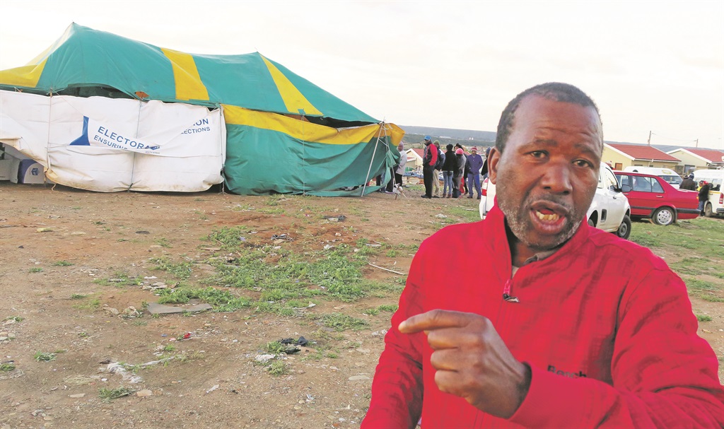 Ndzameko Sipapa outside Veeplaas voting station. He walked 10km to cast his vote on a cold and windy day in Port Elizabeth. Picture: Lubabalo Ngcukana 