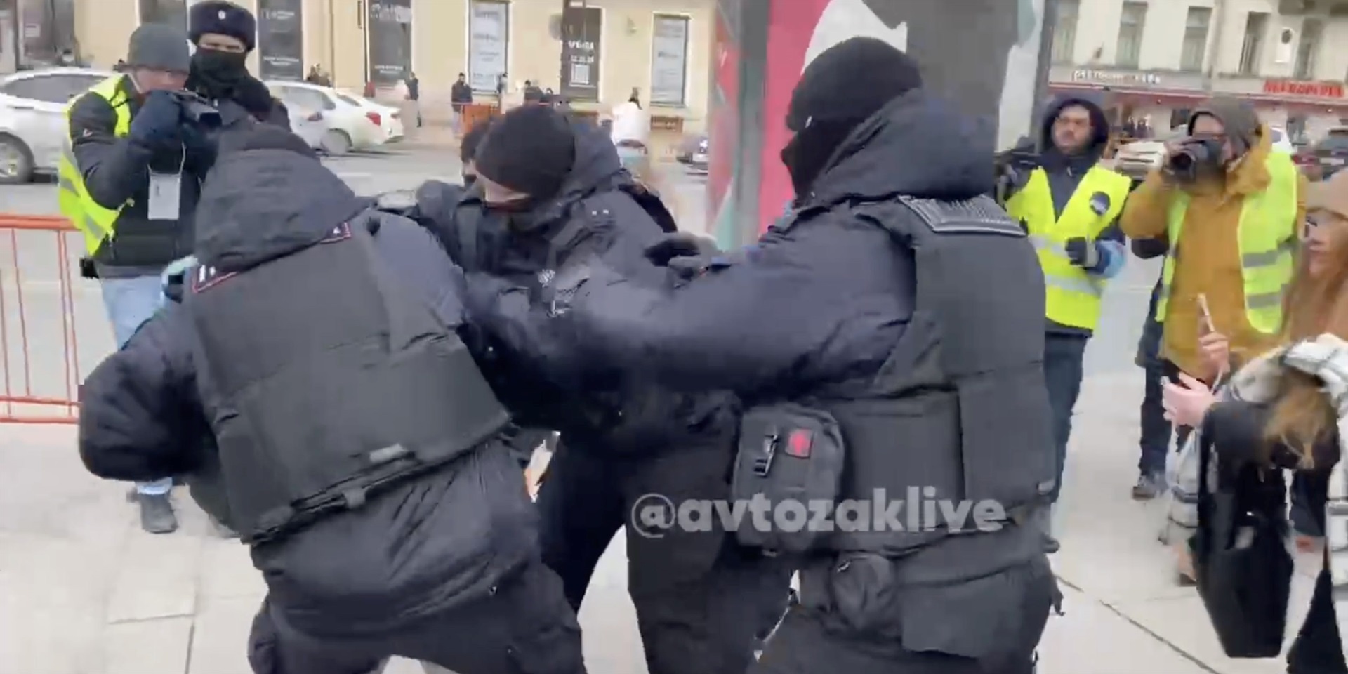Russian police detain a protester in Saint Petersburg, as seen in a video posted by Avtozak Live on Telegram.