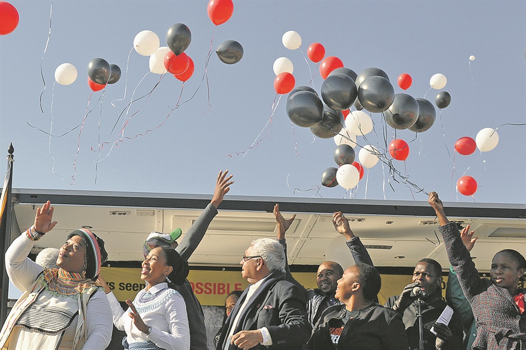 Nelson Mandela’s granddaughter Nkosikazi Nodiyale-Mandela (second left) released 67 balloons at the spot where Madiba was arrested.  Photo by Jabulani Langa 