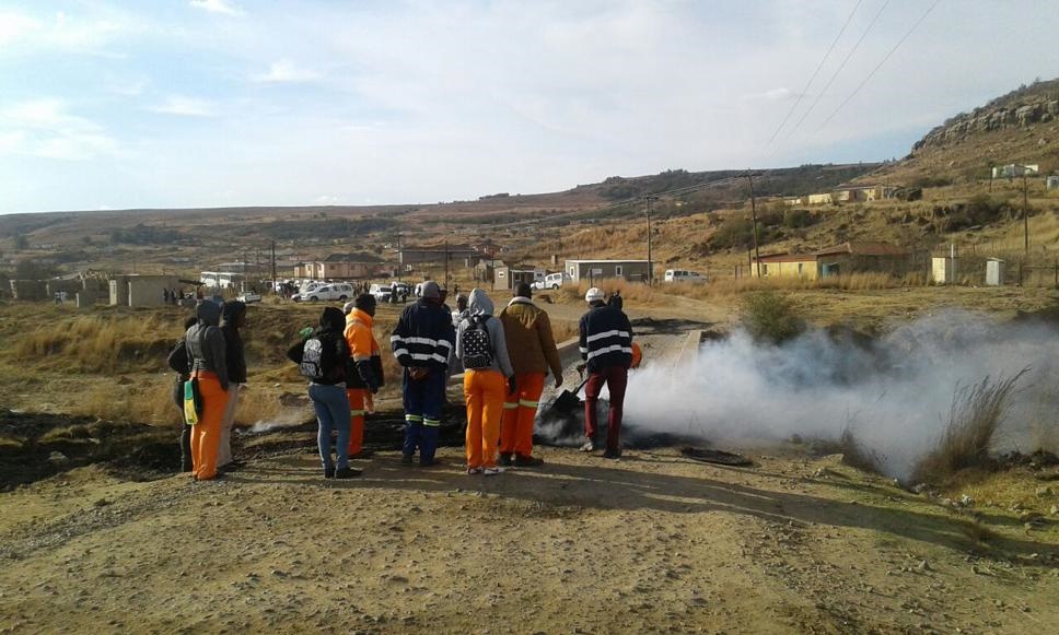 Workers clean up after protestors who blocked the road between Hindenburg and Sibi villages in Maluti blocked the access road linking Maluti to Matatiele. Photo supplied