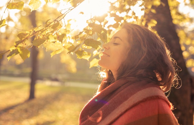 woman breathing in autumn air