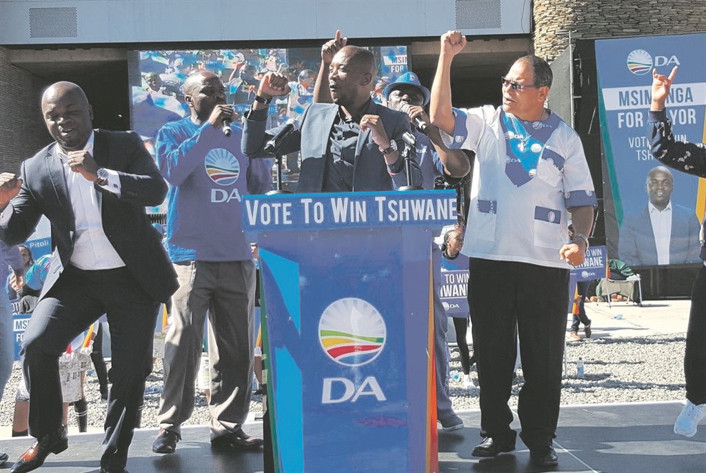 DA mayoral candidate for Tshwane Solly Msimang, in jovial mood, dances alongside party leader Mmusi Maimane and DA provincial head John Moodey. Picture: Supplied 