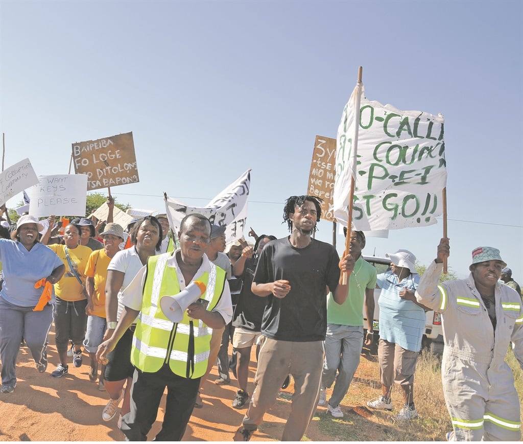 Residents of Bapo march to the tribal office on Wednesday, demanding that the chief be removed. Picture: Lebo Maretele 