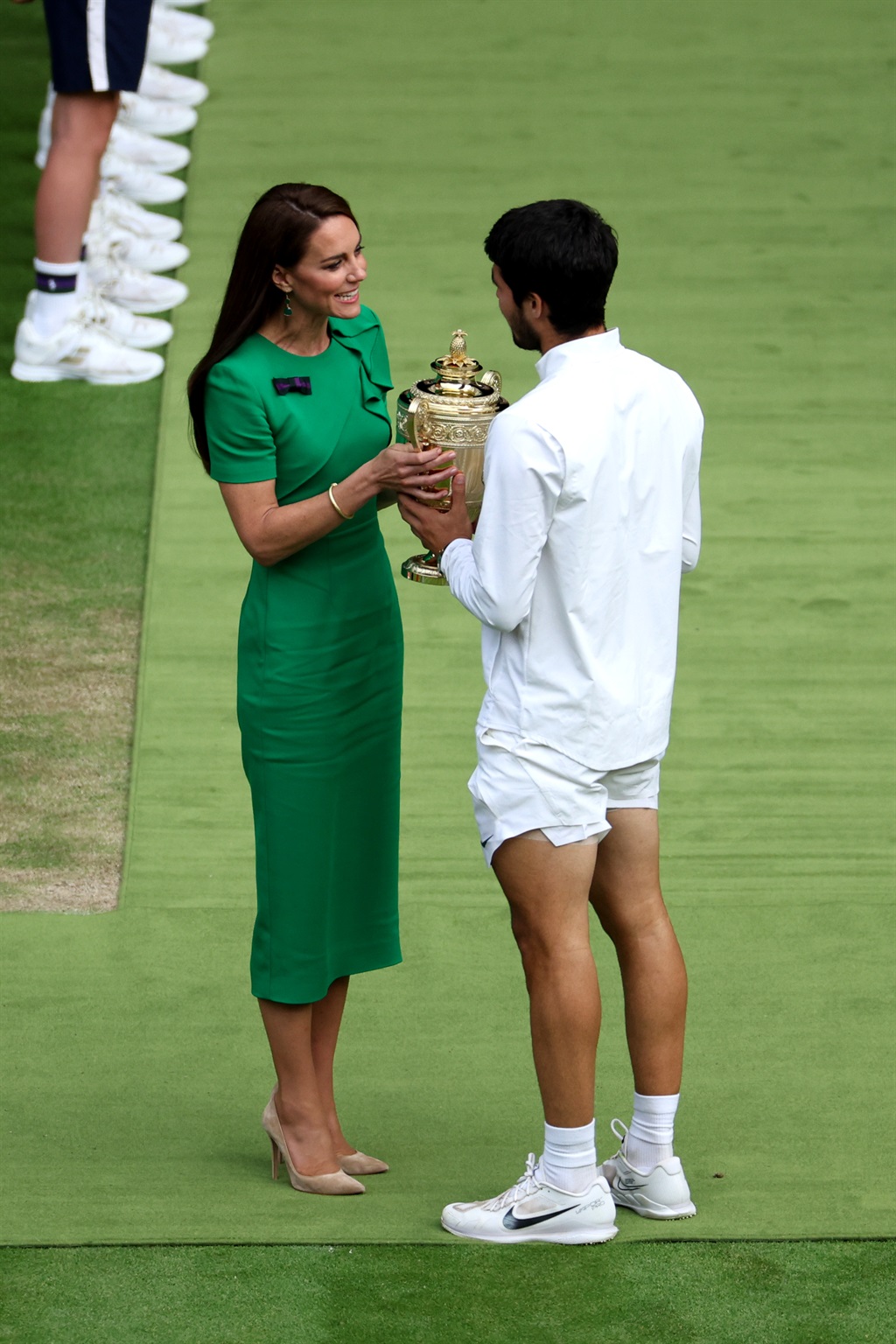 Carlos Alcaraz of Spain receives the Men's Singles