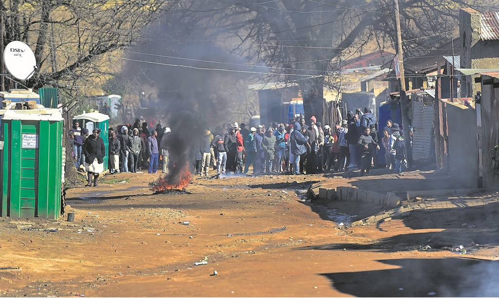 Residents of Kliptown protested over the lack of housing and the high crime rate.              Photo by Themba Makofane   