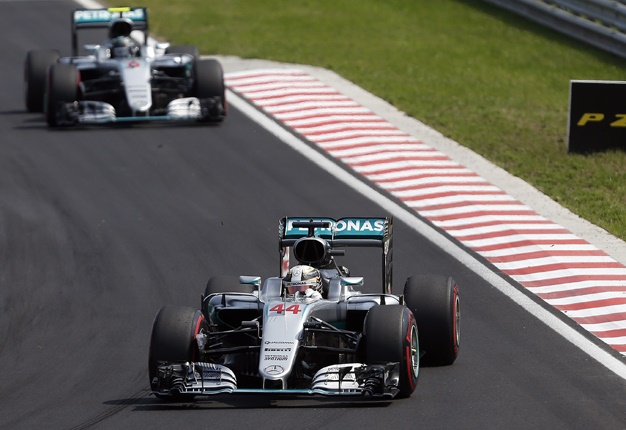 <B>MERC'S DUELING DRIVERS:</B> Lewis Hamilton and Nico Rosberg are dominating the 2016 season. <I>Image: AP / Darko Vojinovic</I>