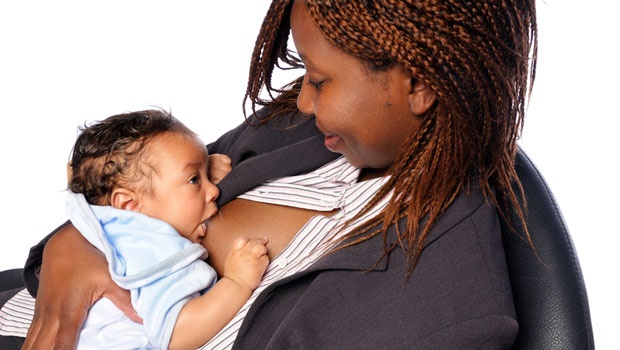 black businesswoman breastfeeding baby
