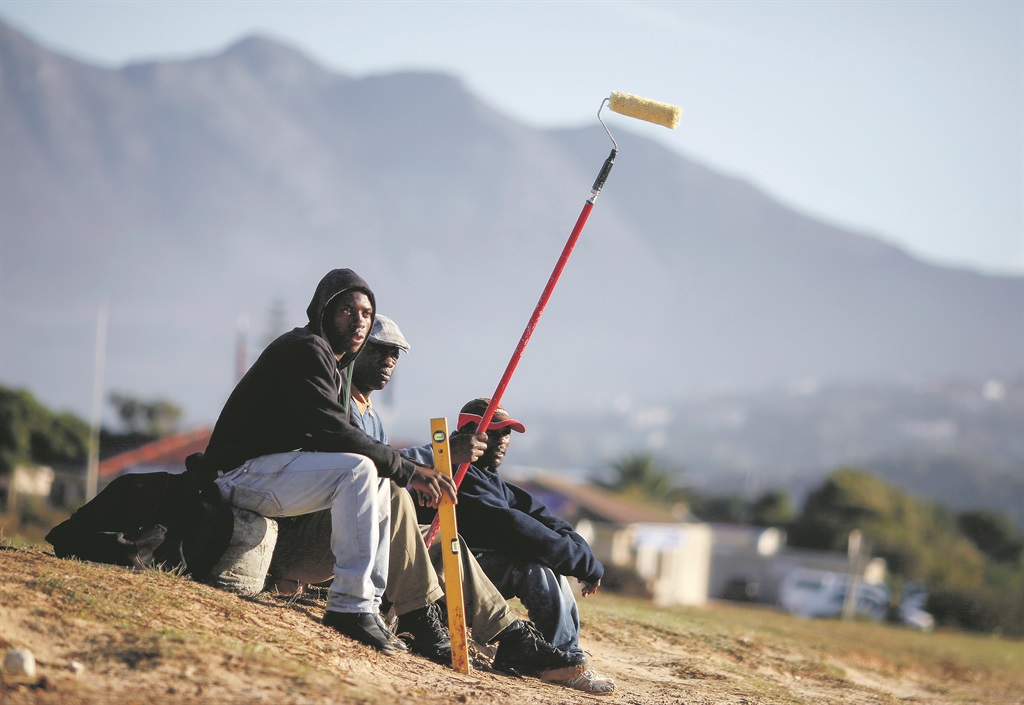 Unemployed builders and painters wait on the side of the road for work in Cape Town. The unemployment rate in the country stands at 26.7%, the highest since September 2005. Picture: EPA / NIC BOTHMA 
