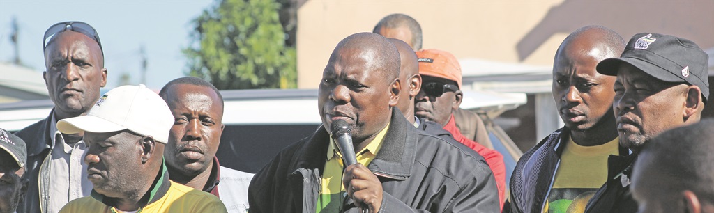 CONCERNED Treasurer-general Zweli Mkhize addresses ANC members after a prayer gathering at murdered councillor Nceba Dywili’s home on Wednesday morning.  Picture: Nosipiwo Manona 