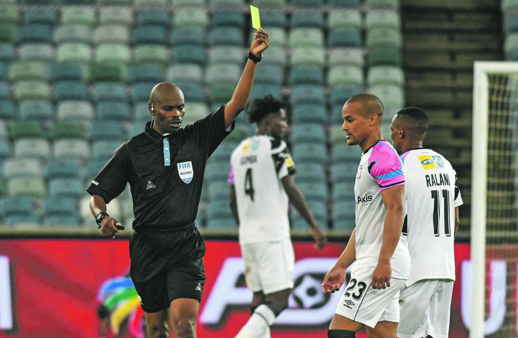 Referee Thando Ndzandzeka cautions Fagrie Lakay of Cape Town City before he laterred-carded the striker after the final whistle of a drama-filled MTN8 final between City and Mamelodi Sundowns in Durban last weekend. Photo: Darren Stewart / Gallo Images