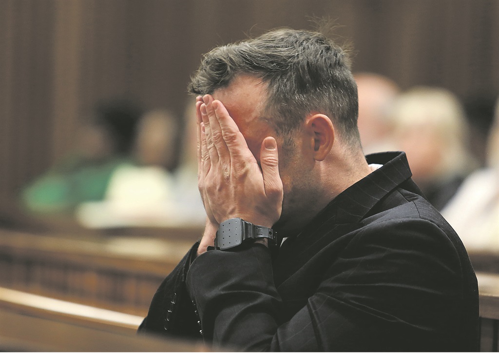 Oscar Pistorius at the North Gauteng High Court during the third day of his sentencing hearing. Pistorius was convicted for the murder of his girlfriend Reeva Steenkamp in 2013  PHOTO: ALON SKUY/ TIMES MEDIA GROUP 