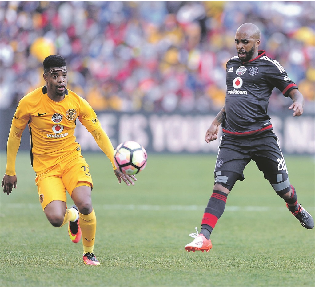 George Lebese of Chiefs and Oupa Manyisa of Pirates go for the ball during the Carling Black Label Champion Cup at FNB Stadium last Saturday. The same fireworks will be expected in the coming season. Picture: Lefty Shivambu / Gallo Images 