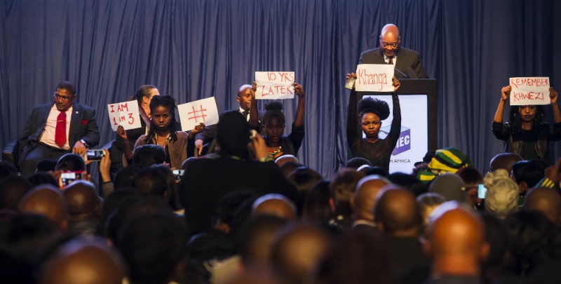 The protest by four women while President Jacob Zuma delivered his speech at the IEC's Results Operations Centre.