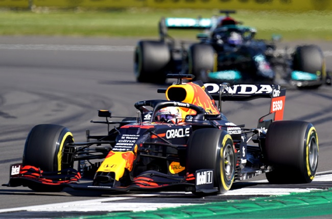 Max Verstappen (front) leading Lewis Hamilton