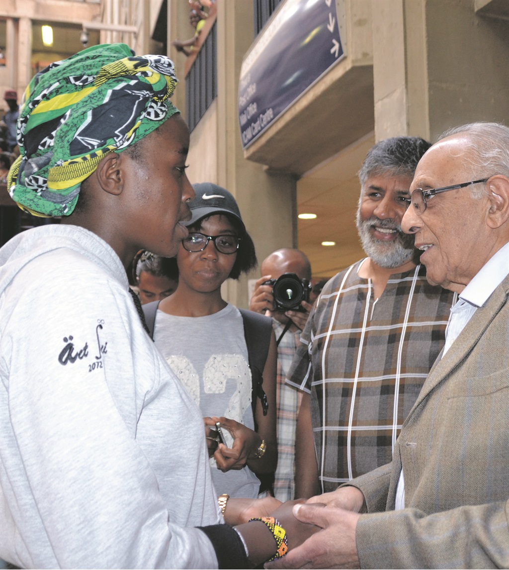 SOLIDARITY Amhed Kathrada speaks to Nompendulo Mkhatshwa at Wits during the #FeesMustFall campaign. Picture: Ahmed Kathrada Foundation 