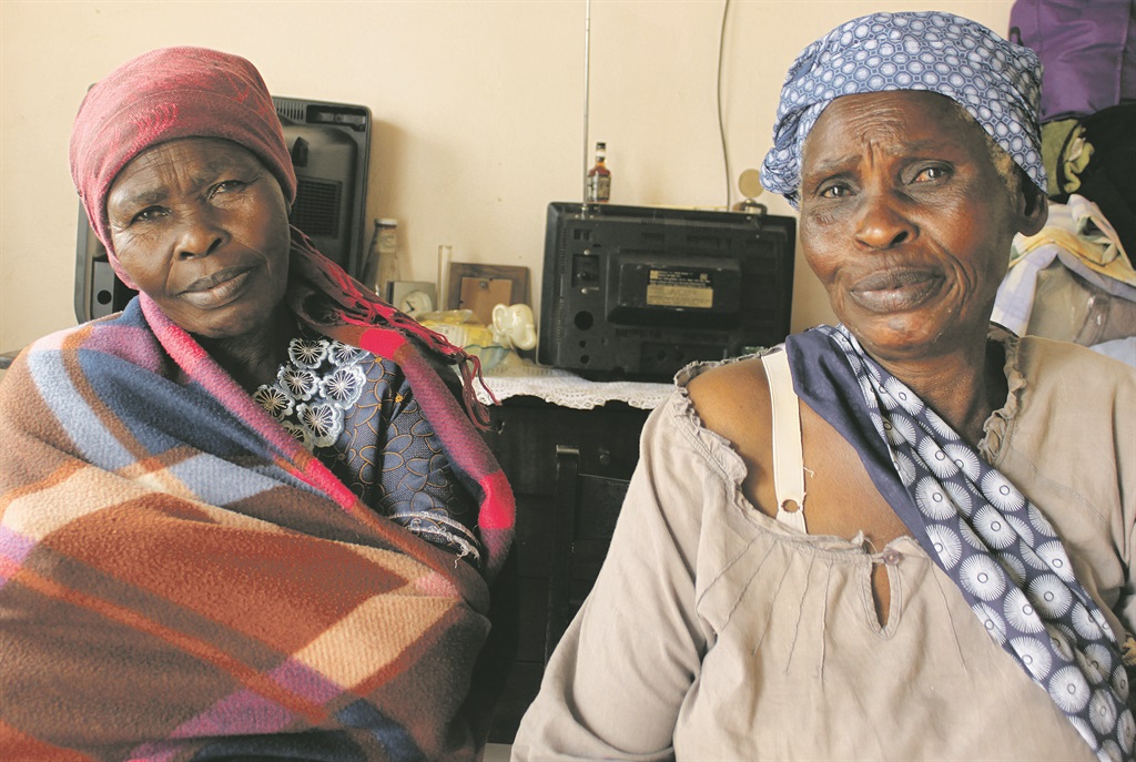 Alfred’s aunts, Mariam Zikhale (left) and Letty Sithole, mourn for him in Mamelodi.           Photo by Andrew Mkhondo 