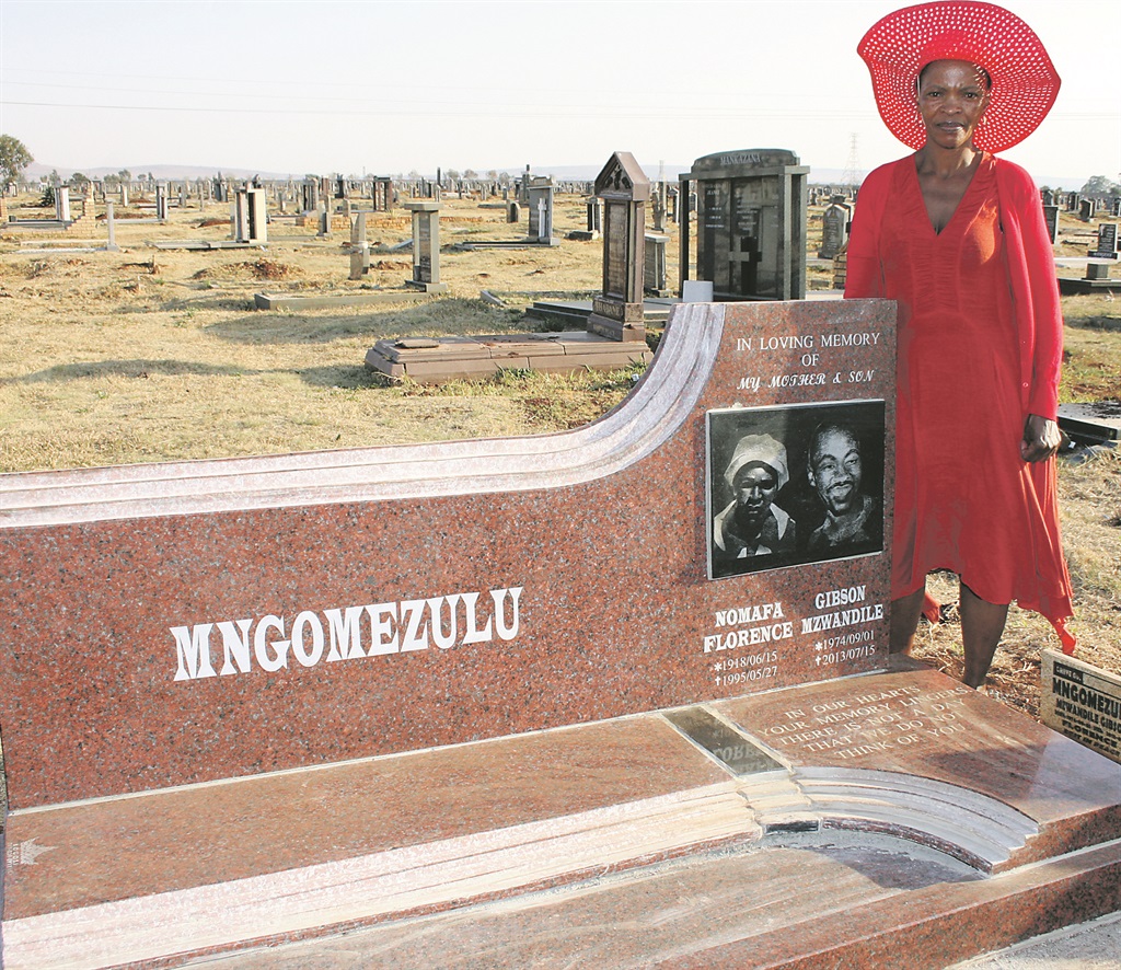 Grace Mngomezulu is not happy at all with the tombstone erected for her mum and son.      Photo by Stephens Molobi 