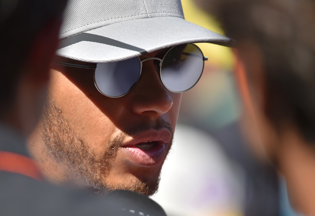 <B>CALLING IT QUITS:</B> Lewis Hamilton ended his early Mercedes test runs with new Pirelli tyres stating that he was feeling unwell.  <i>Image: AFP / Andrej Isakovic</i>