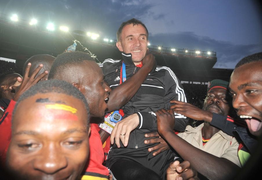 Former Orlando Pirates coach Milutin “Micho” Sredojevic led the Uganda Cranes to the 2017 Afcon after a 38-year absence. Here he is seen lifted by Ugandan players and fans as they celebrate their big achievement. Photos by Backpagepix