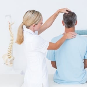 Chiropractor at work – iStock
