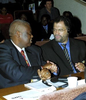 Then Safa president Molefi Oliphant (left) is congratulated by then Safa CEO Danny Jordaan after Oliphant was elected to the CAF executive during the organisation’s congress in Bamako, Mali, in 2002. Picture: Gavin Barker/Gallo images