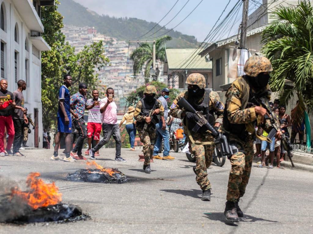 Citizens take part in a protest near the police station of Petion Ville after Haitian president Jovenel Moïse was murdered.