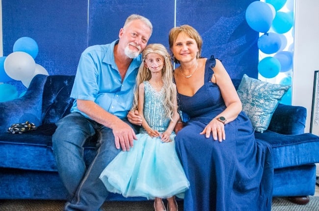 Beandri Booysen with her parents, Pieter and Bea. She recently celebrated her sixteenth birthday with 160 guests. (PHOTO: Supplied)