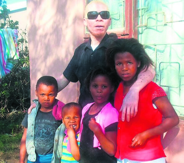 Mziwamadoda Mbolongwane (back) with his kids at his parents’ home in Motherwell NU11.  Photo by Joseph Chirume  