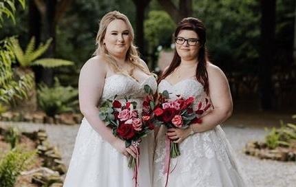 Rachel (left) was bed-bound for nearly a month due to her condition in 2020 and had to rely on Karen (28) - who she married in June this year - to bring her food and painkillers. Image courtesy mediadrumimages.com/ RachelChamp/ Magazine Features