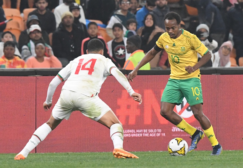 JOHANNESBURG, SOUTH AFRICA - JUNE 17:  Percy Tau of South Africa with ball possession during the Africa Cup of Nations, Qualifier match between South Africa and Morocco at FNB Stadium on June 17, 2023 in Johannesburg, South Africa. (Photo by Sydney Seshibedi/Gallo Images)