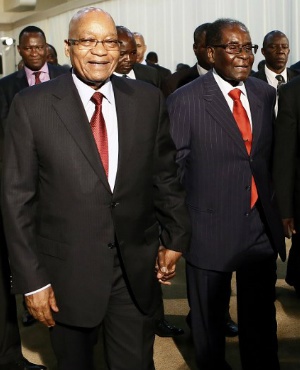 President Jacob Zuma with Robert Mugabe. (Phill Magakoe/AFP)