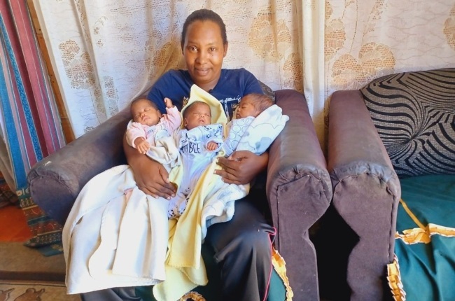 Berenice Jacobs holds her three girls, Chloe, Cleo and Claire. (PHOTO: Supplied)