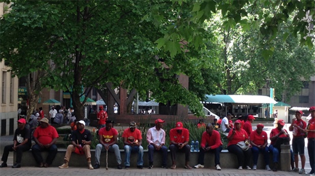 <p>Back in Johannesburg, some of the Cosatu members took a detour to the Chamber
of Mines. They are waiting for their comrades to arrive.</p><p>Pic: Lameez Omarjee</p><p></p>