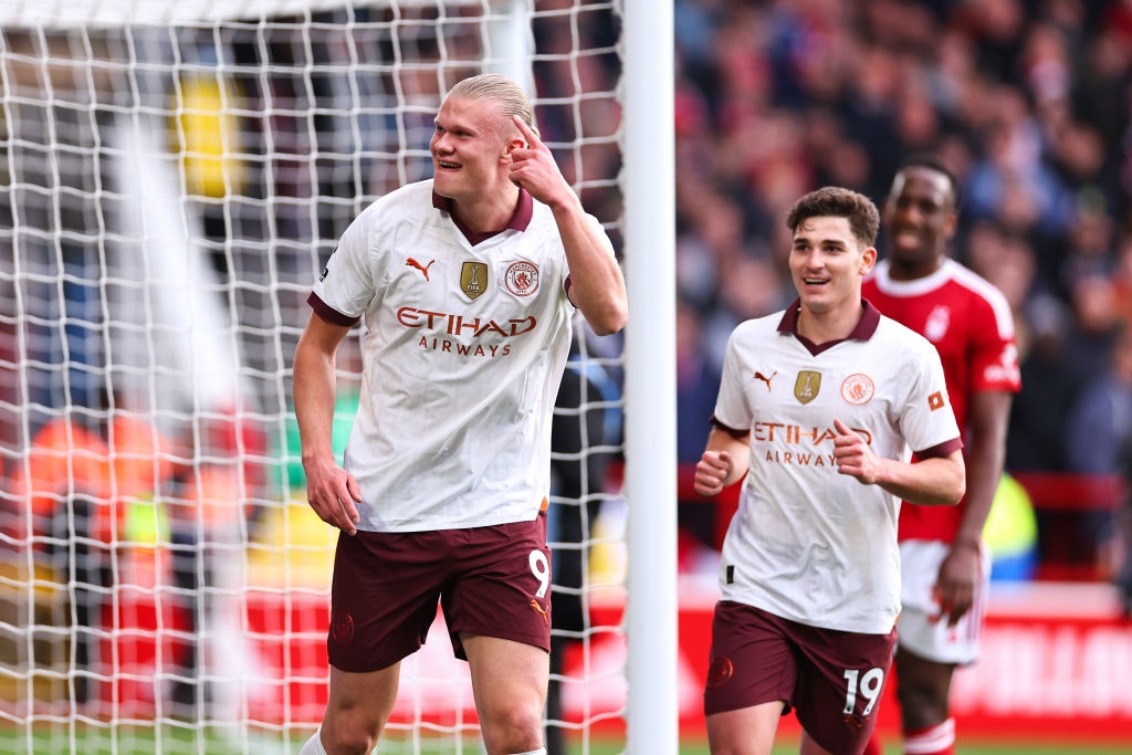 NOTTINGHAM, ENGLAND - APRIL 28: Erling Haaland of Manchester City celebrates after scoring a goal to make it 0-2 during the Premier League match between Nottingham Forest and Manchester City at City Ground on April 28, 2024 in Nottingham, England.(Photo by Robbie Jay Barratt - AMA/Getty Images)