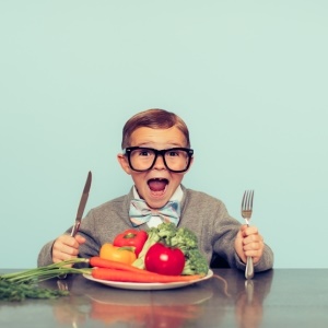 Kid loves healthy food – iStock