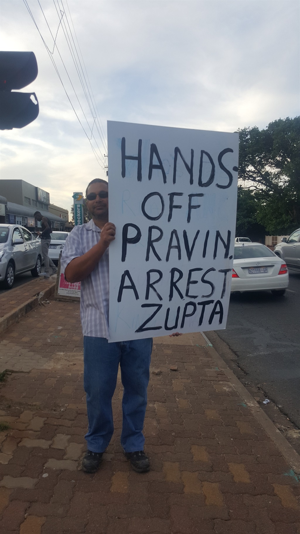 HANDS OFF PRAVIN ‘Peter’ is nearing the second day of his one-man picket in support of Finance Minister Pravin Gordhan  PHOTO: nICKI GULES 