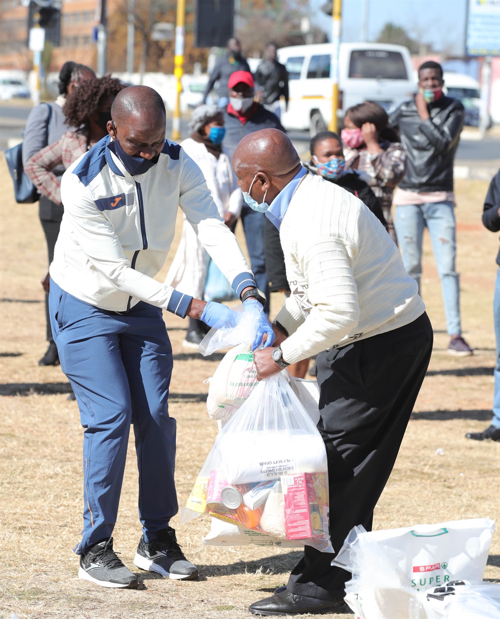 Victor Hlungwani During the Food Parcel Handover T