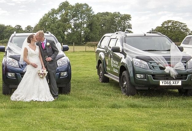 <b>HAPPY WEDDING :</b> Instead of opting for classic, shiny white wedding cars, a farming couple chose a fleet of 11 rugged Isuzu KB bakkies for their nuptials. <i>Image: Isuzu</i>