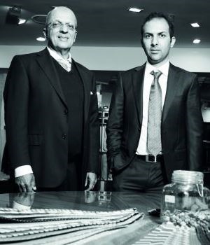 Khalik Moosa, owner of Khaliques (L) with his son Mohammed Faeez, who is being taught the ropes to take over the family business.